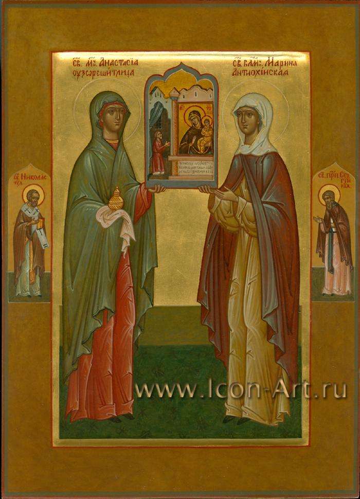 Фото: Семейная икона. Святая мц. Анастасия Узорешительница и святая великомуч. Марина Антиохийская. На полях иконы святой Николай чудотворец и святой Сергий Радонежский. В руках святые держат икону Пресвятой Богородицы «Нечаянная Радость»