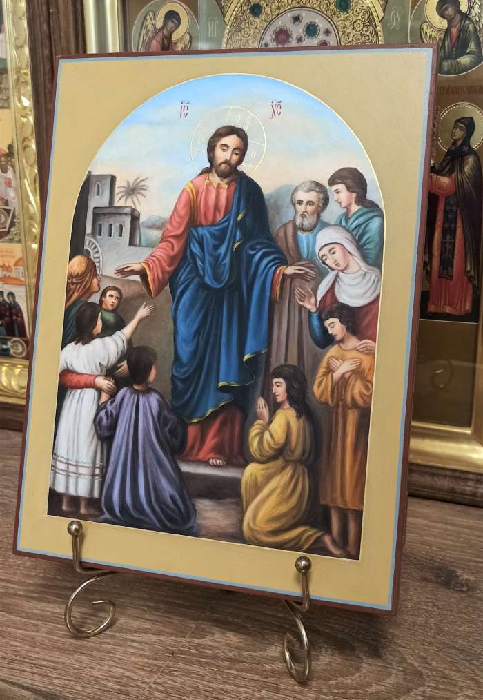 Фото: Икона Спасителя, благословение детей